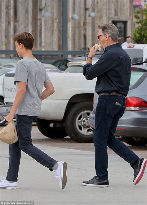 pierce brosnan relaxed as he enjoys a snack stop with son paris daily mail online