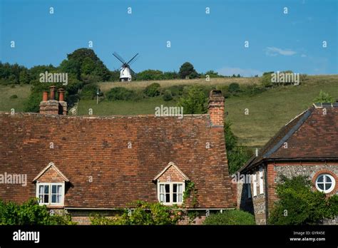 Turville Village Showing The Gravestones And Cobstone Windmill In Th