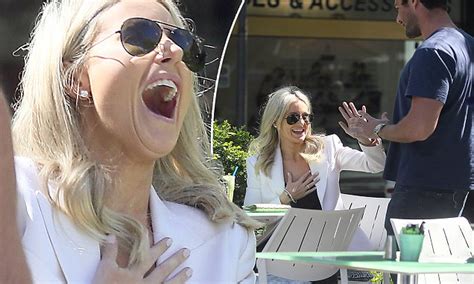 roxy jacenko has a chuckle with a strapping male friend at lunch a week after starting