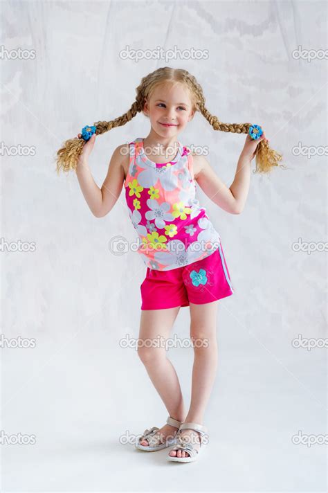 Girl With Two Funny Pigtails Stock Photo By ©zoiakostina 25440155