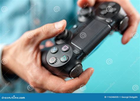 Male Hands Holding A Ps4 Controller Editorial Image Image Of Gaming