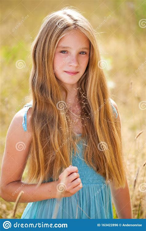 Portrait Of A Beautiful Young Blonde Little Girl Stock