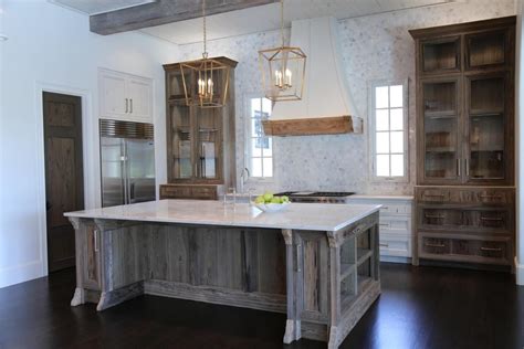 Many companies sell salvaged kitchen cabinets. Property Photo | Wood kitchen island, Reclaimed wood ...