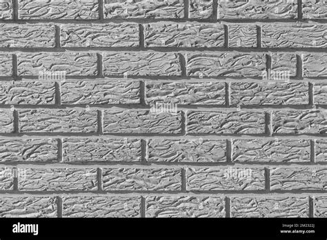 Grey Brick Wall With Abstract Decorative Stucco Plaster Pattern Modern