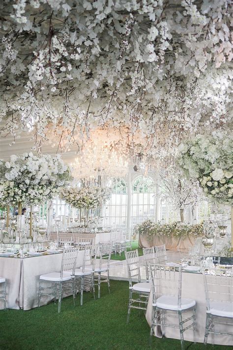 visit the post for more hanging flowers wedding all white wedding wedding ceiling