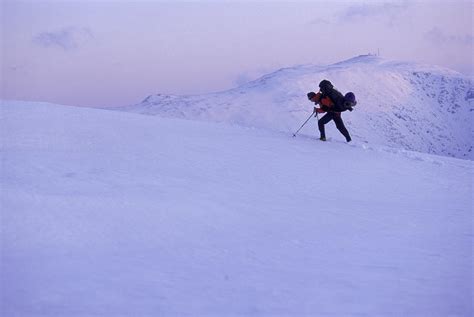 A Man Climbing A Snowy Mountain New Photograph By David Mclain Fine