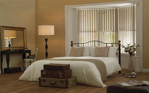 Increase bedroom privacy with window film. Vertical Blinds In A Bay Window - Surrey Blinds & Shutters