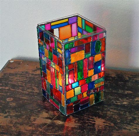 This charming modern ornamental design immediately boosts the interior's ambiance. How to Make Faux Stained Glass Mosaic Luminary - DIY ...