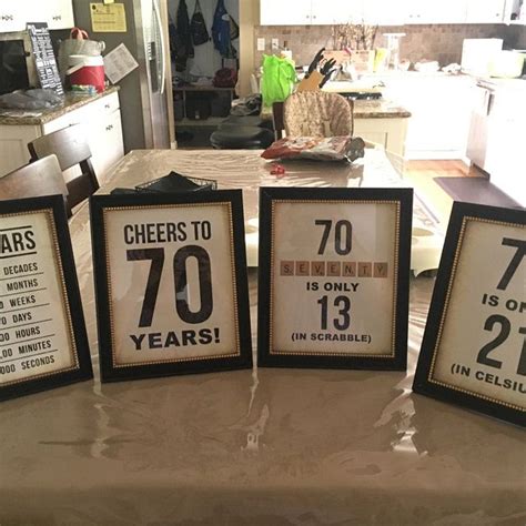 Three Framed Numbers Are Displayed On A Table