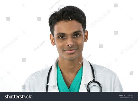 Young Indian Doctor Wearing A Green Scrubs A White Coat With