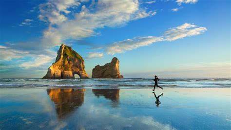 Beach Running Women Clouds Rock Rock Formation Sky Wallpapers Hd