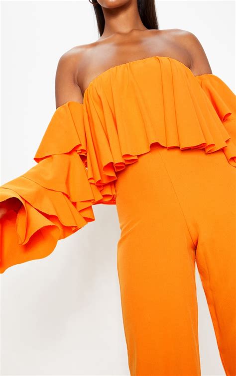 Bright Orange Ruffle Sleeve Bardot Jumpsuit Prettylittlething