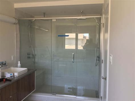 Typically, glass door fixtures are designed to be positioned from outside the shower and fastened from inside. Custom Shower Doors & Enclosures | M&T Glass