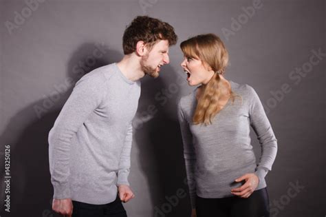 Husband And Wife Yelling And Arguing Stock Photo Adobe Stock