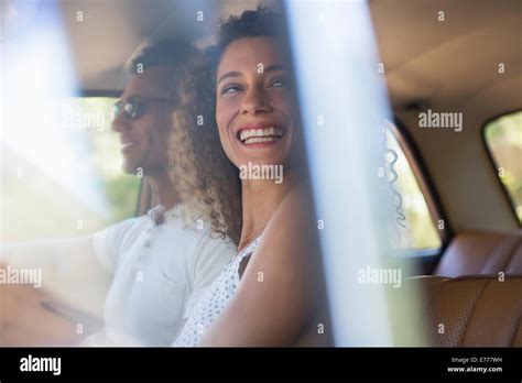 Woman Riding In Car With Boyfriend Stock Photo Alamy