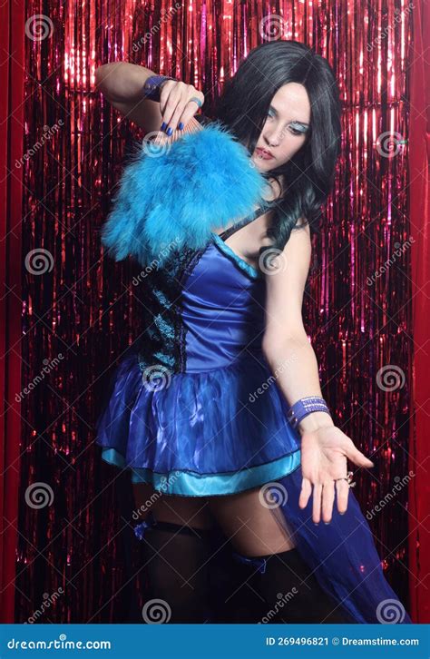 Woman Wearing Blue Corset Preforming Burlesque Dance With Feather Fan Stock Image Image Of