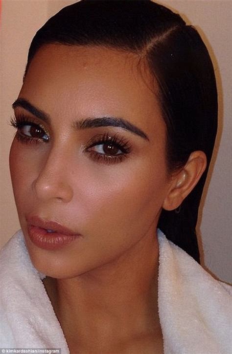 Kim Kardashian Shares Pouty Photos In A Bathrobe Daily Mail Online