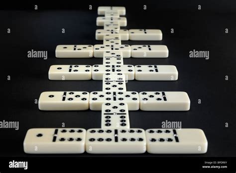 Dominoes Lined Up Leading Away Counting Down 6543210 With Doubles In Alternating Positions Stock