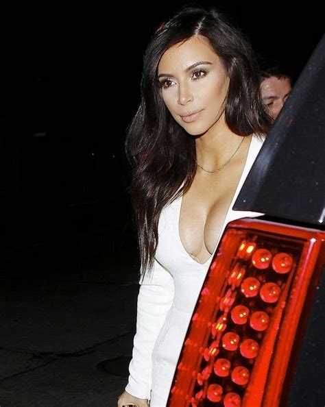 Kim Kardashian Cleavage In Low Cut Tight White Dress Arriving At