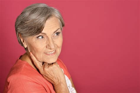 Premium Photo Close Up Portrait Of Beautiful Smiling Senior Woman Posing