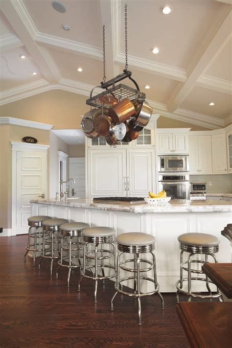 In that situation, pendant lights over your kitchen island will end up looking out of place. Vaulted ceiling decorating kitchen traditional with white ...