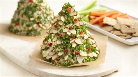 I am saying this because i really love the way these christmas tree desserts be it that christmas tree pull apart pizza bites or that christmas tree brownie pops or that christmas tree cupcake or that christmas tree shaped. Holiday Tree-Shaped Cheese Ball | Recipe | Holiday ...