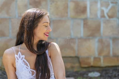a lovely brunette model enjoys an spring day outdoors stock image image of cute brunette