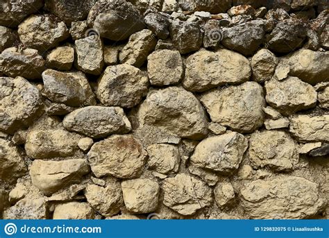 The Texture Of An Ancient Destroyed Stone Wall Stock Image Image Of