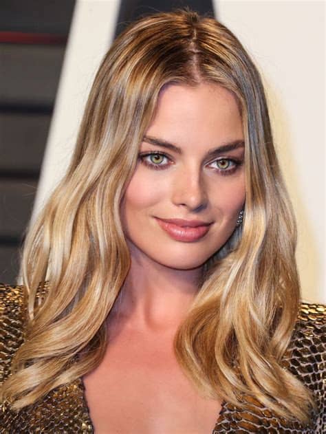 A character or person depicted has green colored eyes. Insanely gorgeous golden blonde hair. Looks so beautiful ...
