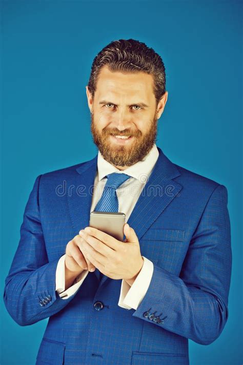 Handsome Man With Phone In Hand New Technology And Communication Stock
