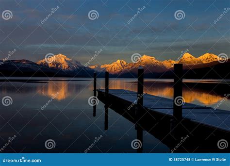 Sunset Mountains Reflection Lake Dock Stock Photo Image Of Rugged