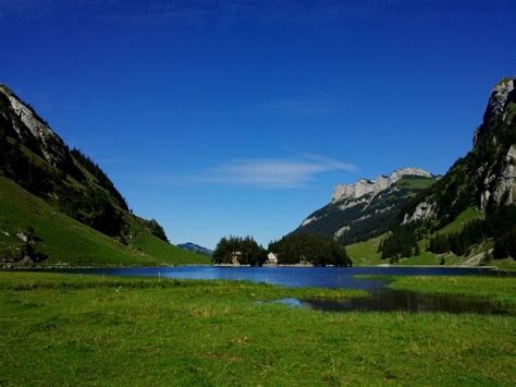 Seealpsee is a breathtaking alpine lake in switzerland. Seealpsee (Wasserauen, AI) - schweizersee.ch