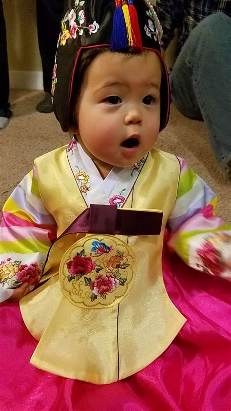 my daughter is half korean she just turned 1 and we dressed her in hanbok r pics