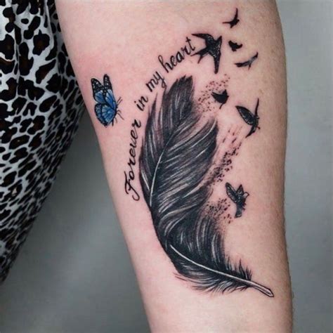beautiful looking feather tattoo designs with their meaning body tattoo art