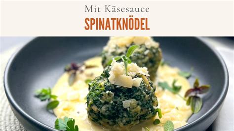 Vegetarische Köstlichkeit Spinatknödel in cremiger Käsesauce