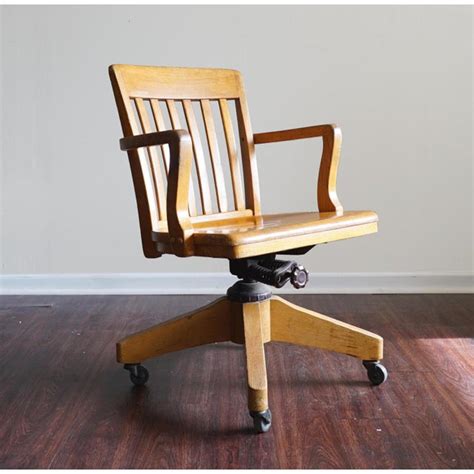Be proactive at work when you roll this high office chair into the office to accompany your high desk. Vintage Wooden Swivel Rolling Desk Chair | Chairish