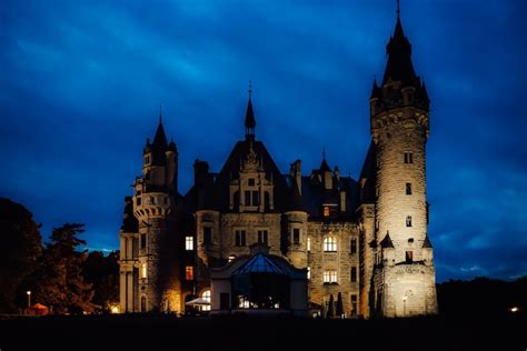 Premium Photo Old Polish Castle In The Village Of Moszna In The Night