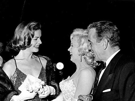 Marilyn Monroe Lauren Bacall And Humphrey Bogart Attend The Premiere
