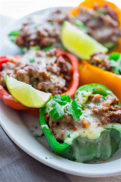 Spoon the remaining 1/2 cup tomato sauce over the peppers. low carb mexican stuffed peppers - Healthy Seasonal Recipes