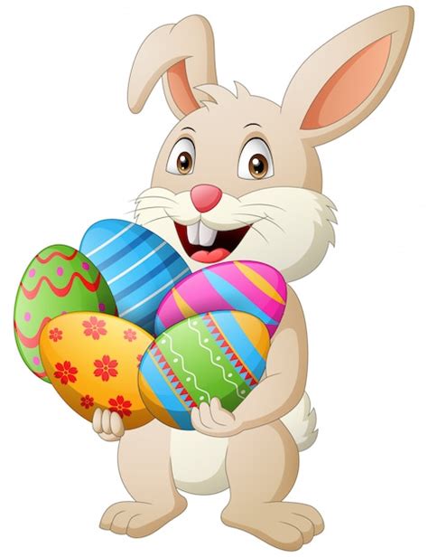 Premium Vector Cartoon Rabbit Holding Easter Eggs Illustration