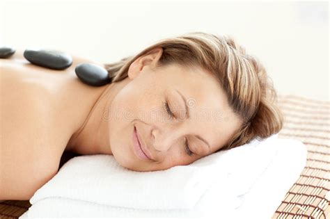 Spa Salon Woman Relaxing Having Hot Stone Massage Bodycare Stock Image Image Of Treatment