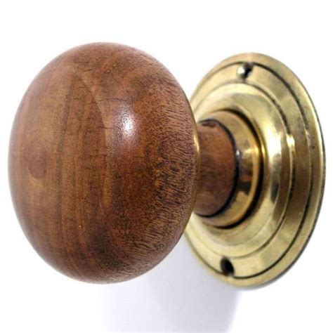 Bun Wooden Morticerim Door Knobs Oak Effect And Brass Broughtons