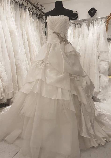 The Victoria Gown A Satin Ball Gown In A Strapless Bodice The