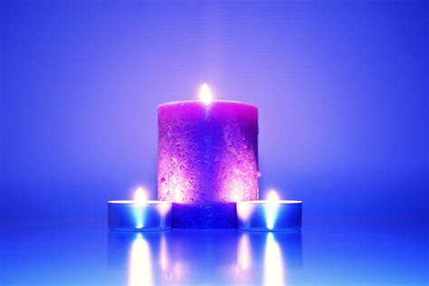 Three Lighted Candles · Free Stock Photo