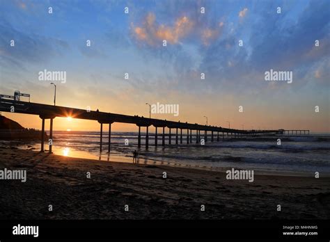 The Sunset Over The Ocean Beach Pier Near San Diego California Stock