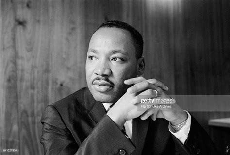 Civil Rights Leader Martin Luther King Jr Listens At A Meeting Of