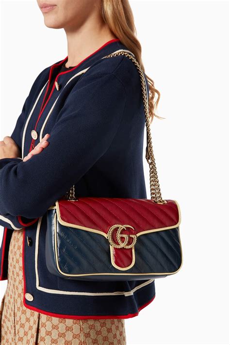 Shop Gucci Red Small Gg Marmont Shoulder Bag In Matelassé Leather For