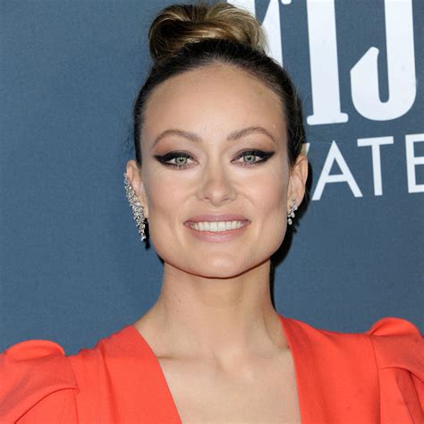 Olivia Wilde Shows Off Her Toned Body In A Grey Sports Bra And Matching