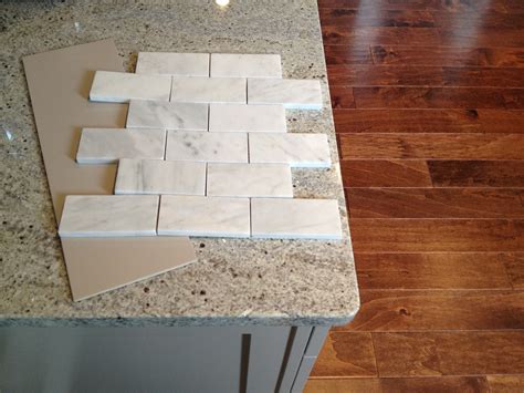 A tile wet saw makes this tile backsplash project much faster and easier…with better results than other methods of tile cutting. loft & cottage: marble backsplash preview