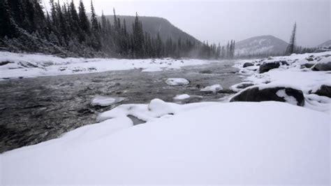 Icy Winter River In Snowstorm Stock Footage Videohive